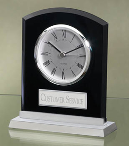 6 1/4" x 5 3/8" Black desk clock with silver finish and a silver base. Includes a silver plate personalized with text, image, or logo. Order Online or Call the Corporate Connection 800-523-2344