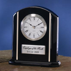 This black and silver quartz desk clock can be customized with your text or company logo. Quantity Discounts
