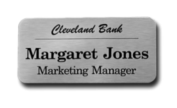 Silver Aluminum Namebadge with round corners customized with Name, title or artwork. Order online or Call The Corporate Connection 1-800-523-2344