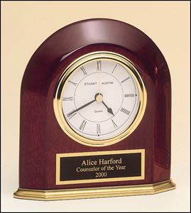 5 5/8" x 5 7/8" Standing arched rosewood desk clock with gold accents and black brass plate personalized with text, image, or logo.  Order Online or Call the Corporate Connection 800-523-2344