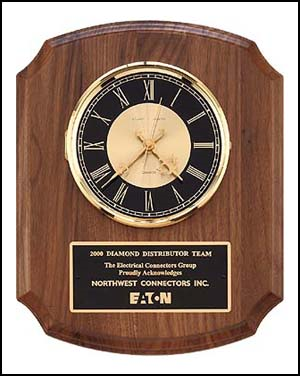 10 1/5" x 13" Walnut wood wall clock mount with engraved brass black plate customized with text, image, or logo. Order Online or Call the Corporate Connection 800-523-2344
