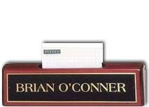 8.5" Rosewood desk nameplate with black brass plate customized with text, image, or logo.  Includes a center display for business cards.  Order online or call the Corporate Connection 800-523-2344