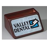 4" Mahogany business card holder with full color print on front. Personalized with text, image, or logo. Order Online or Call the Corporate Connection 800-523-2344