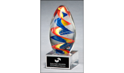 7 1/8" x 2 3/4" Glass egg-shaped award with spiraling colors inside. Includes a black with silver lettering plate personalized with text, image, or logo. Order Online or Call the Corporate Connection 800-523-2344