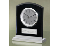6 1/4" x 5 3/8" Black desk clock with silver finish and a silver base. Includes a silver plate personalized with text, image, or logo. Order Online or Call the Corporate Connection 800-523-2344