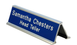 2 x 8 Double Sided Nameplate with Holder. Many font styles to choose from. You can also upload a company logo. Order online or Call The Corporate Connection 1-800-523-2344