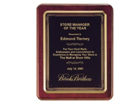 10 1/5" x 13" Rosewood plaque with black brass plate fully customized with text, image, or logo.  Great for gifts and awards. Order online or call the Corporate Connection 800-523-2344.